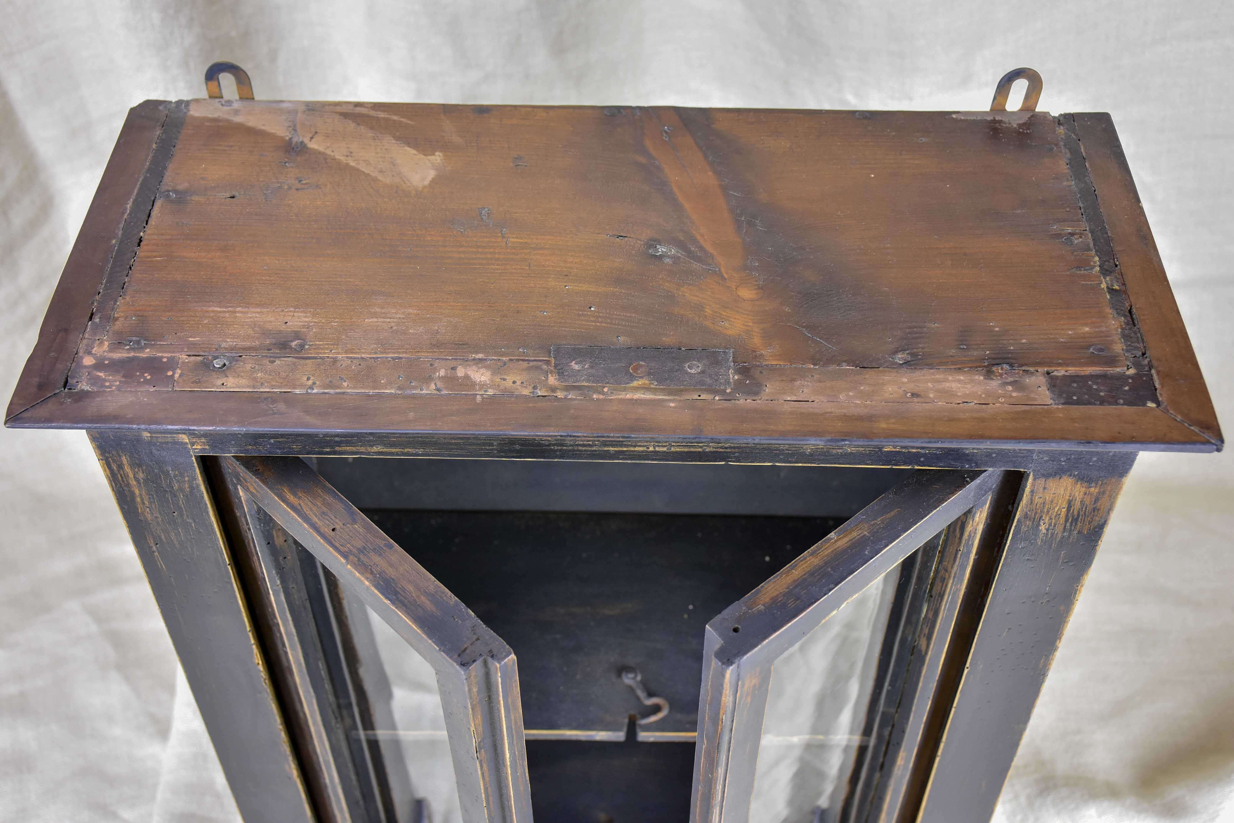Small late 19th Century French glass door cabinet