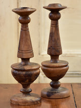 Pair of antique olivewood candlesticks