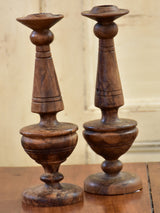 Pair of antique olivewood candlesticks