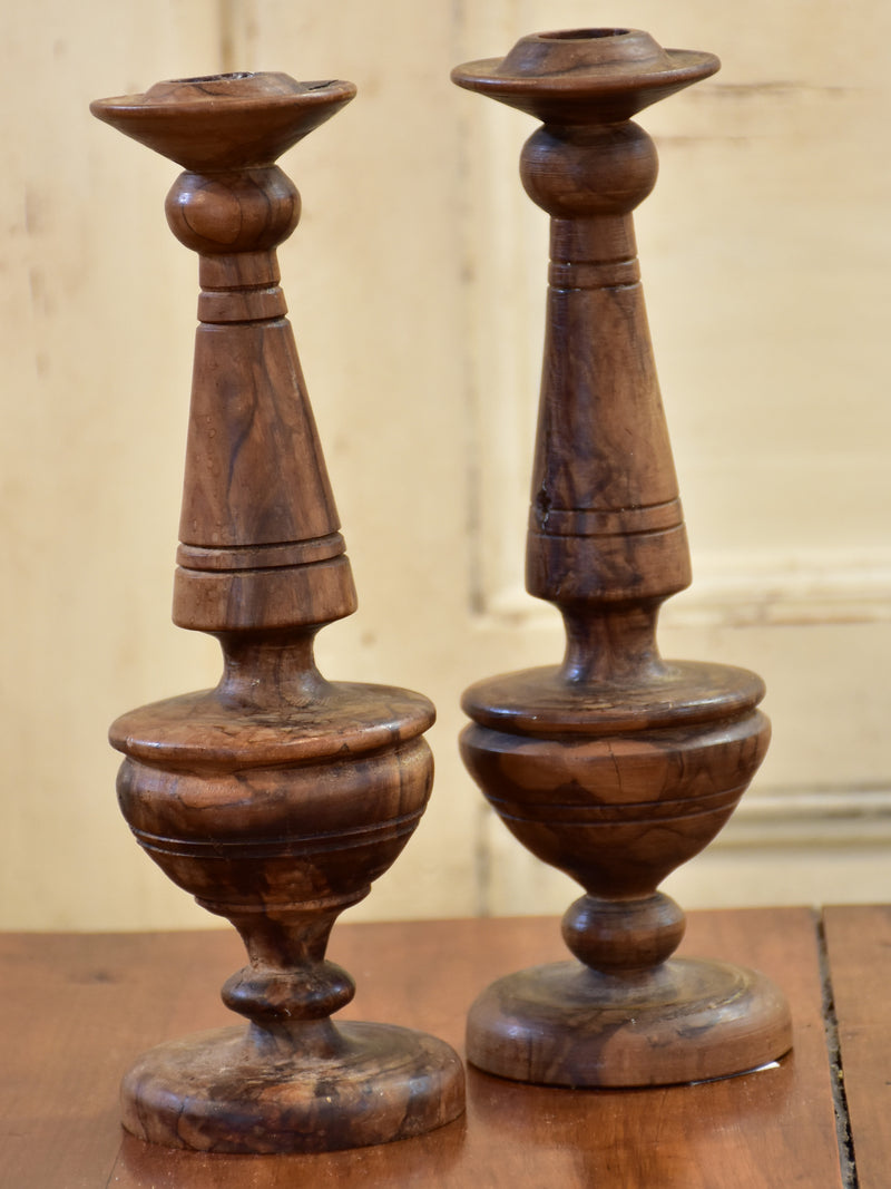 Pair of antique olivewood candlesticks