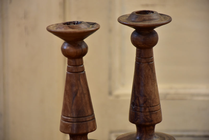 Pair of antique olivewood candlesticks