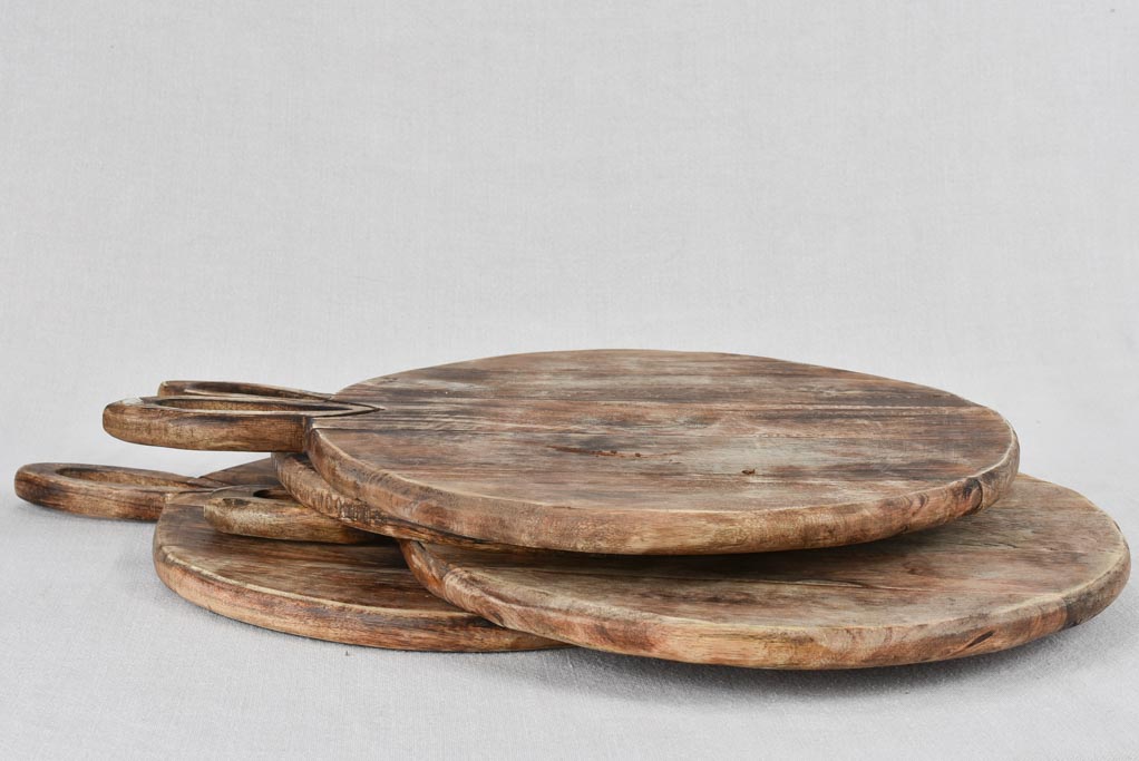 Collection of four round cutting boards 14½"