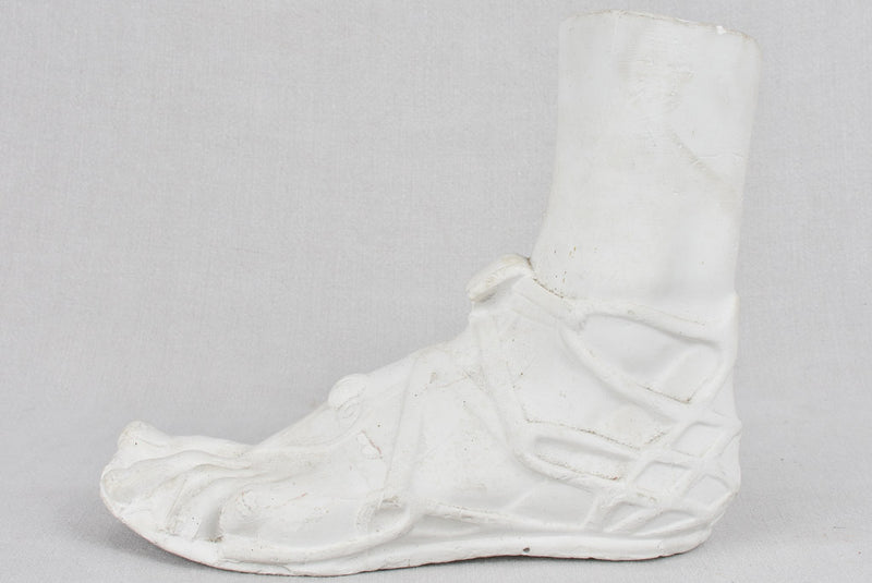 Sculpture of a foot in a sandal, vintage