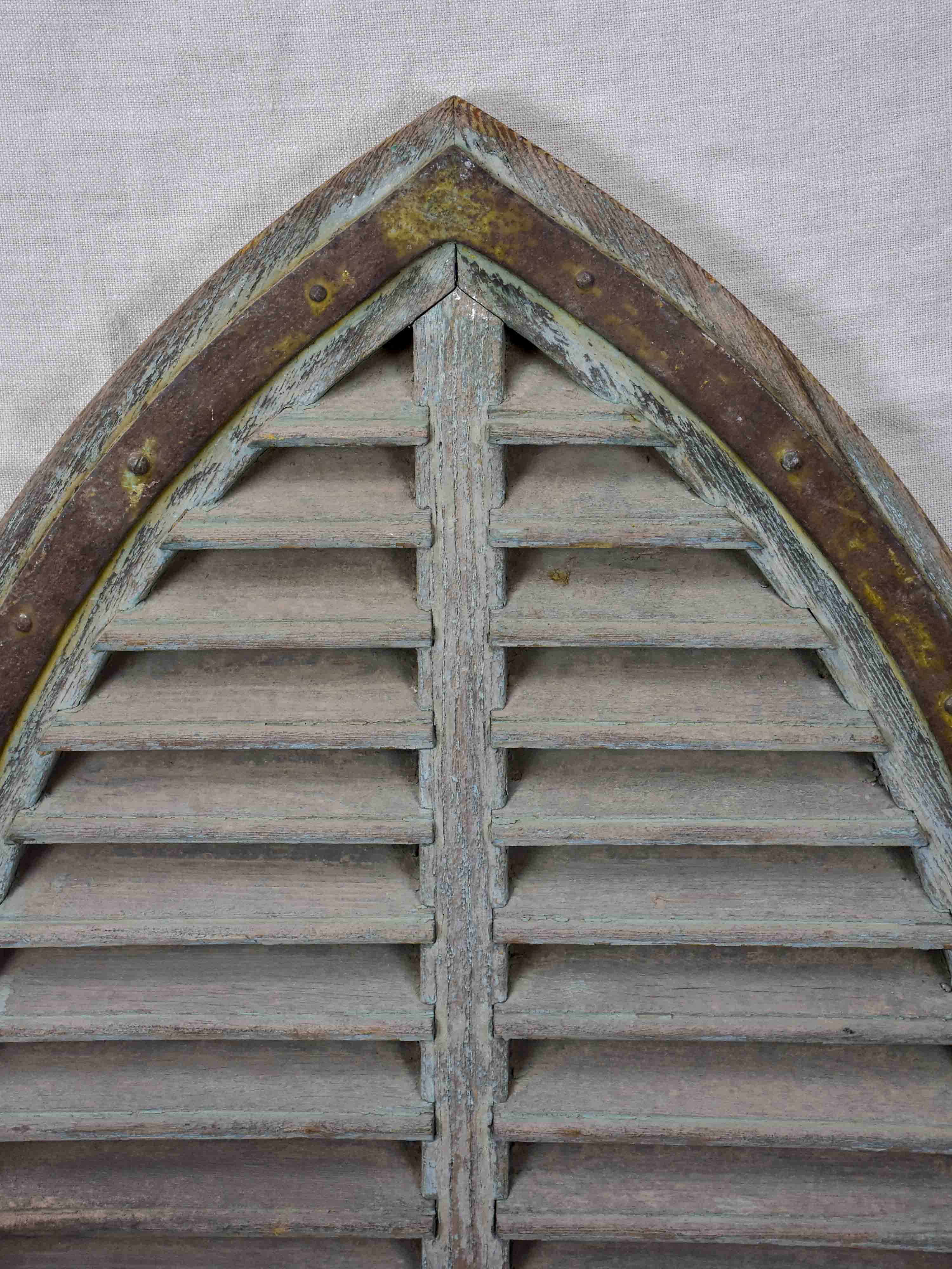 Antique French window with shutters - peaked arch