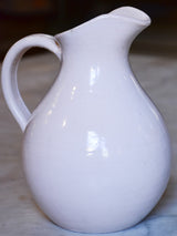 Antique French terracotta pitcher with white glaze