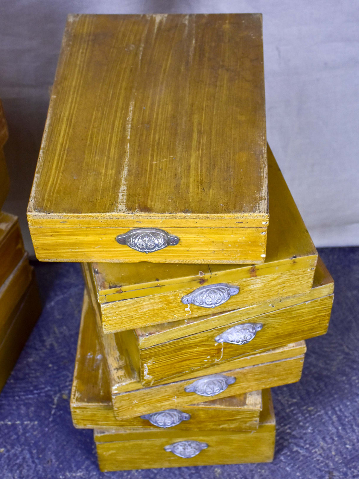 Set of twelve antique French boxes from a glove shop