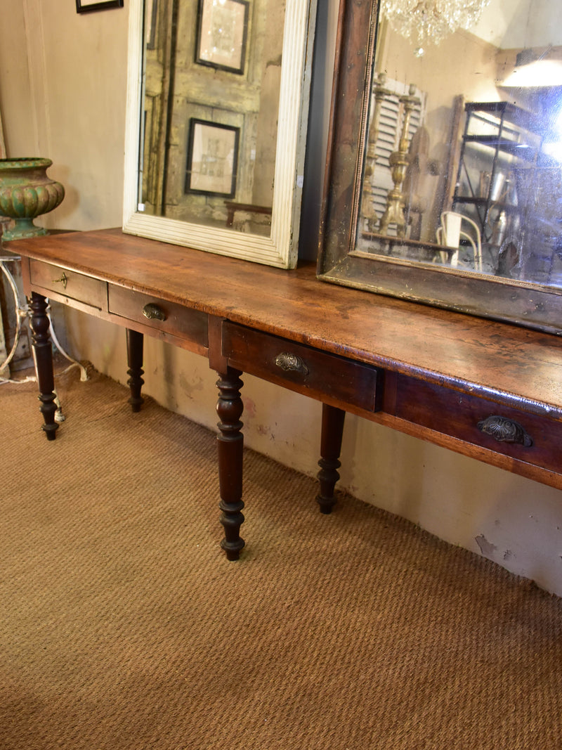 Large antique French console table from a boutique