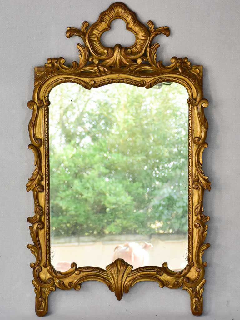 Late 19th-century Louis XV style gilt mirror with pediment 23¼" x 37¾"