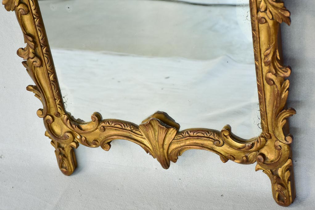 Late 19th-century Louis XV style gilt mirror with pediment 23¼" x 37¾"