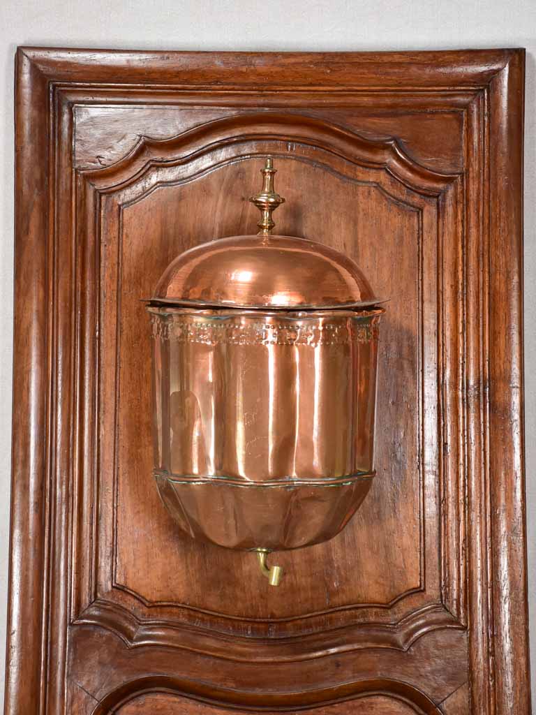 Louis XIV walnut boiserie panel with copper fountain and basin