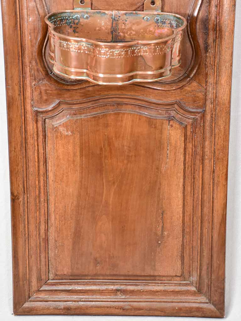 Louis XIV walnut boiserie panel with copper fountain and basin
