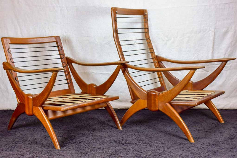 Two 1960's Scandinavian teak armchairs with ski shaped armrests