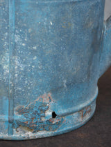 Antique French watering can with blue patina