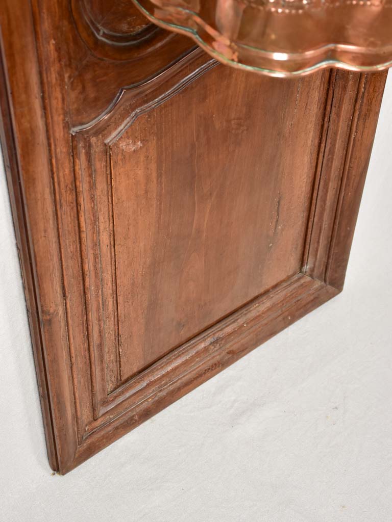 Historic walnut boiserie with basin