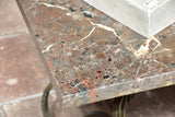 Marble top coffee table with decorative wrought iron base
