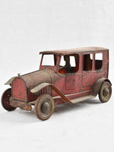 Antique red toy car with details