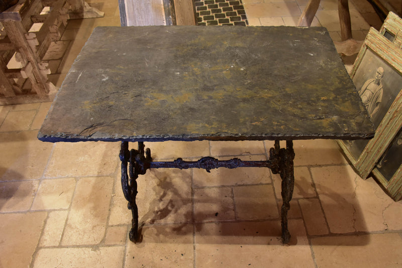 Antique French garden table with slate top and decorative cast iron base