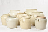 Collection of 8 antique stoneware crock pots 7½" - 12½"