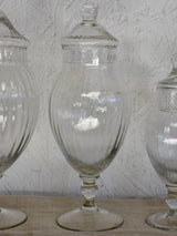 Three vintage French glass vanity jars with lids