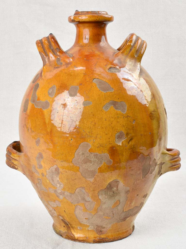 Ochre glazed conscience jug with 4 handles 14½"