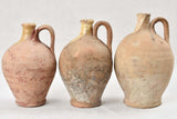Collection of three antique French water jugs 9½"