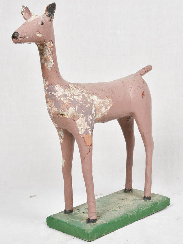 Small mid century garden statue of a deer with a veiled pink patina 28¾"