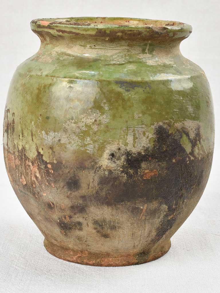 Small antique confit pot with green glaze, no handles 7½"