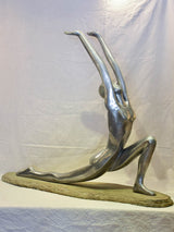 Large vintage resin sculpture of a woman practicing yoga