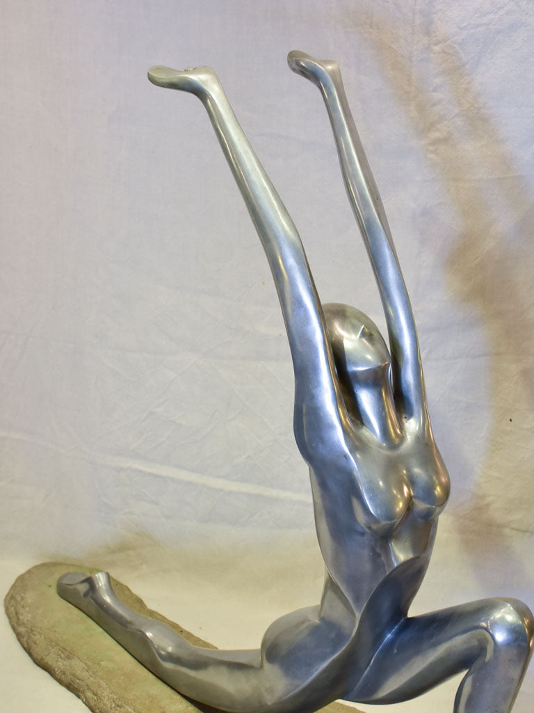 Large vintage resin sculpture of a woman practicing yoga
