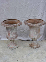Pair of large 19th Century cast iron Medici urns 26½"