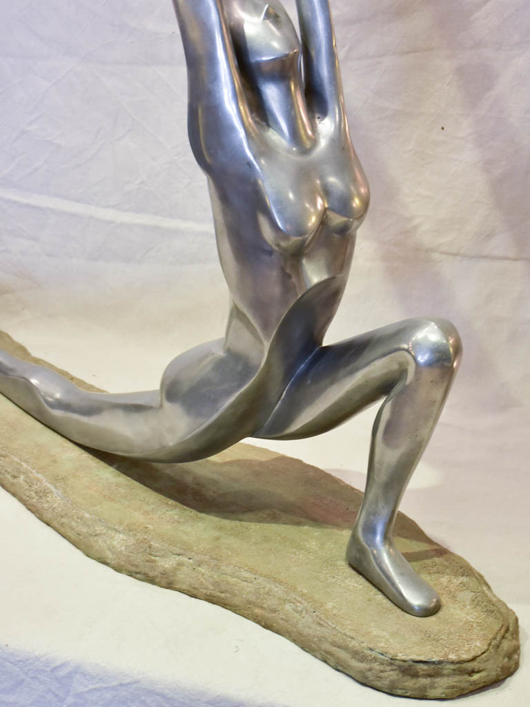Large vintage resin sculpture of a woman practicing yoga