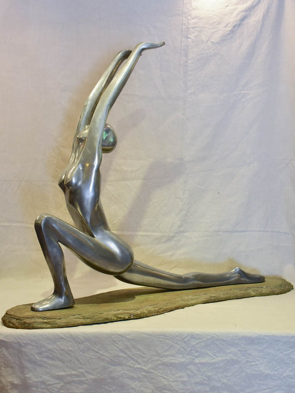 Large vintage resin sculpture of a woman practicing yoga