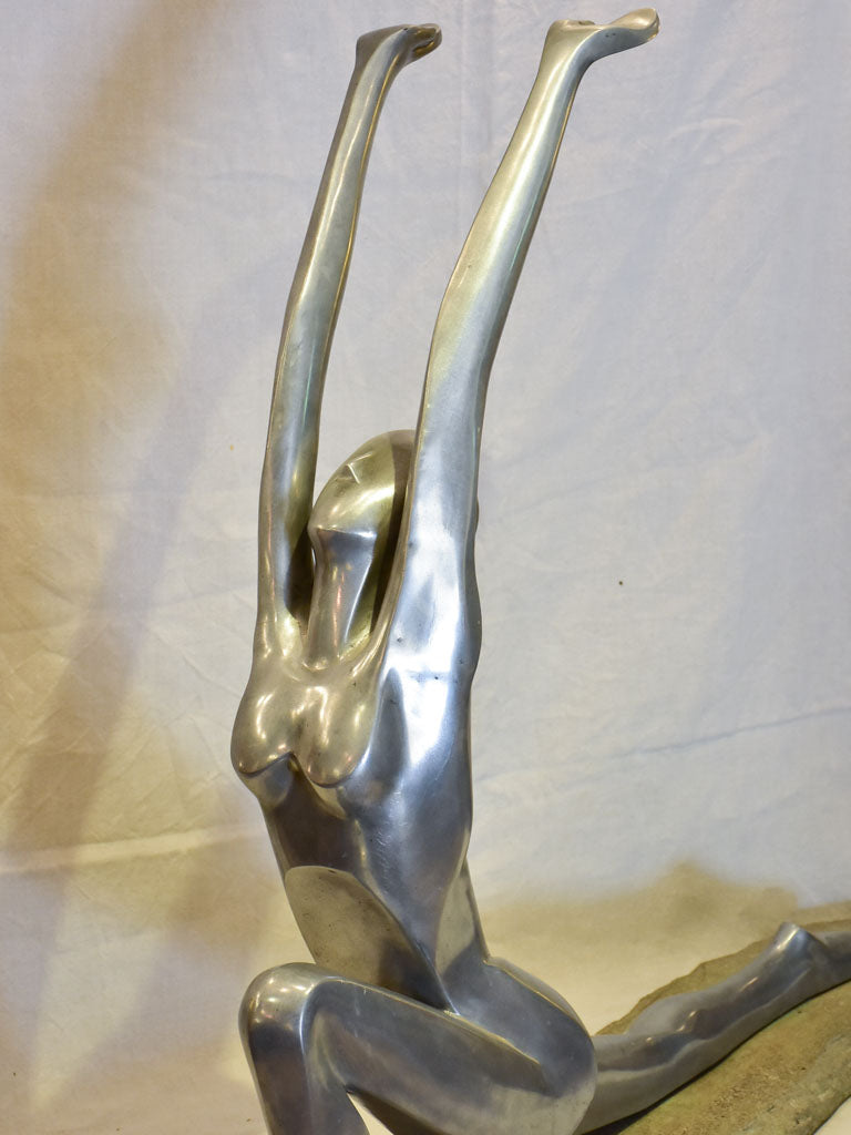 Large vintage resin sculpture of a woman practicing yoga