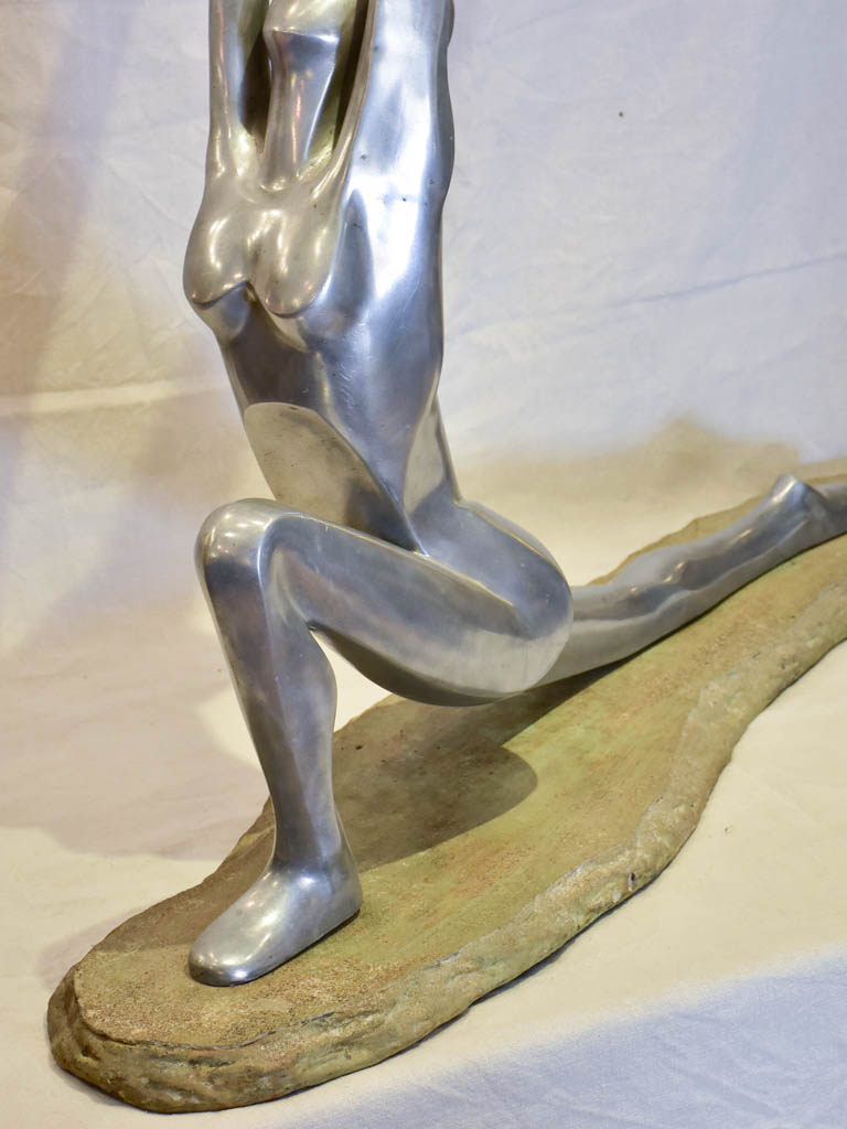 Large vintage resin sculpture of a woman practicing yoga