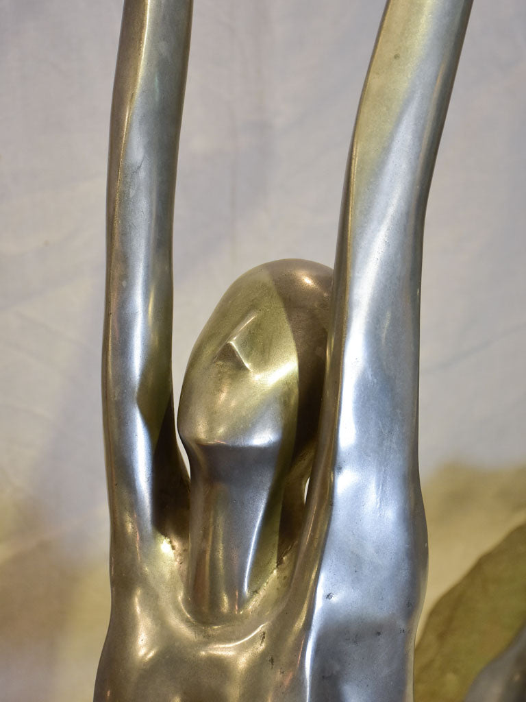 Large vintage resin sculpture of a woman practicing yoga