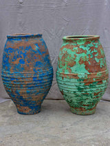 Two very large antique Spanish olive oil jars - blue and green