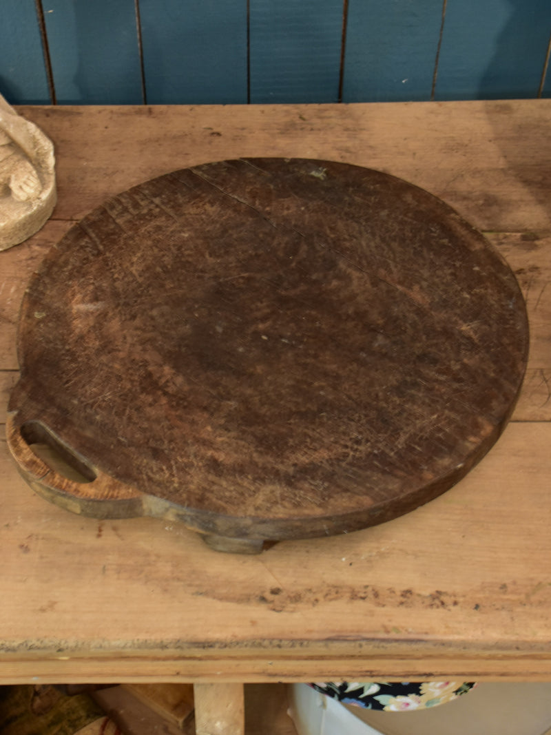 Large antique round cutting board with handle