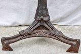 Art Nouveau cast iron bistro table with red glass table top