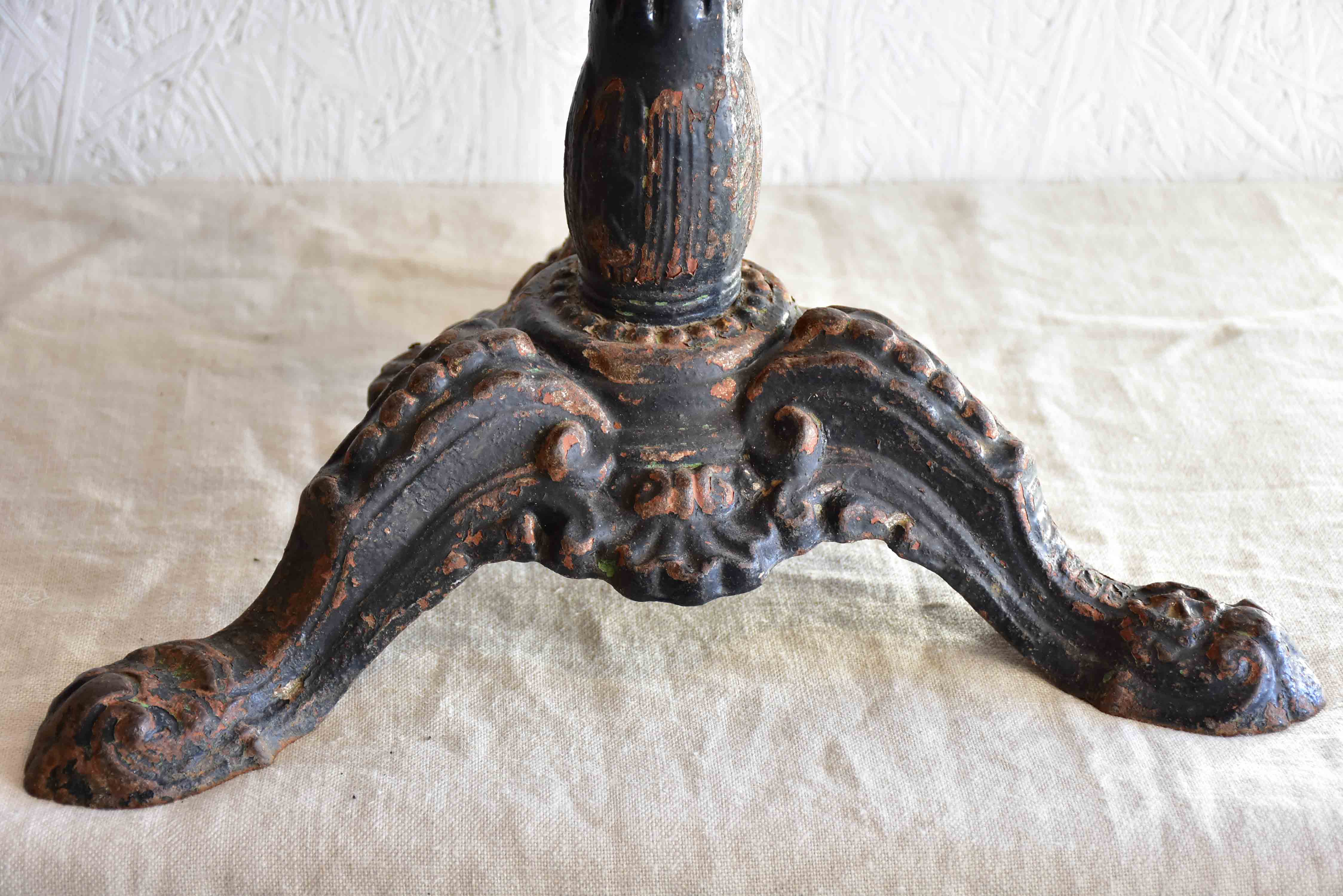 19th Century French bistro table with cast iron base