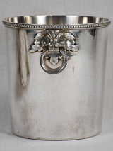 Early 20th-century ice bucket with lions' heads handles
