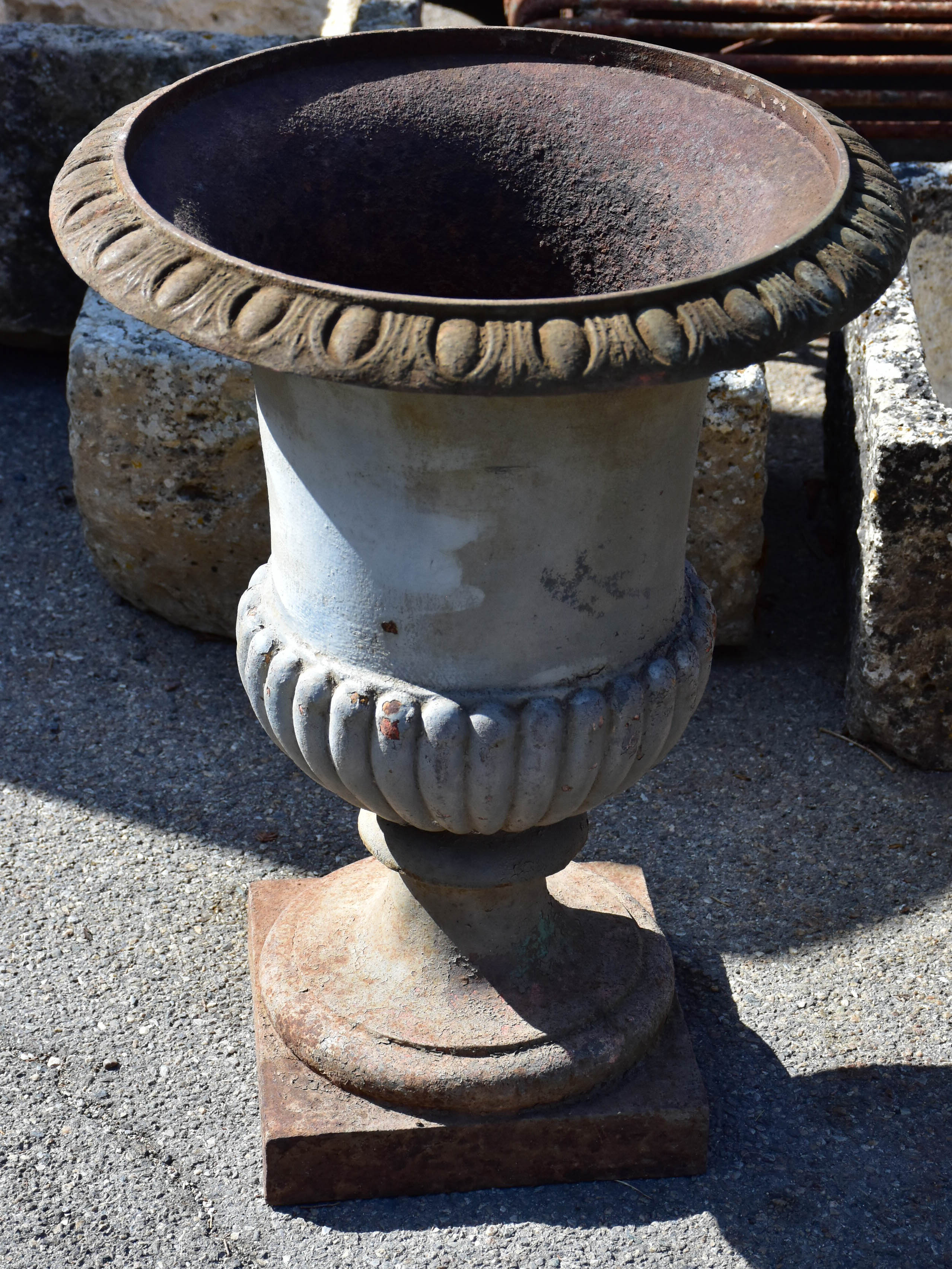 Collection of four cast iron medici urns from the 19th century