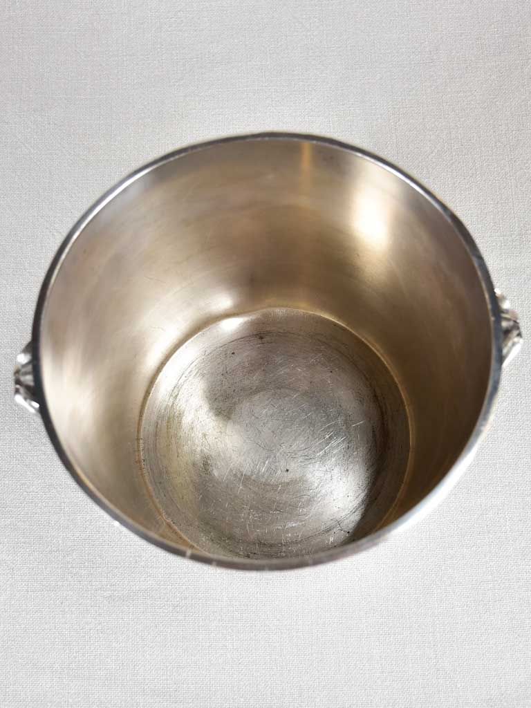 Early 20th-century ice bucket with lions' heads handles