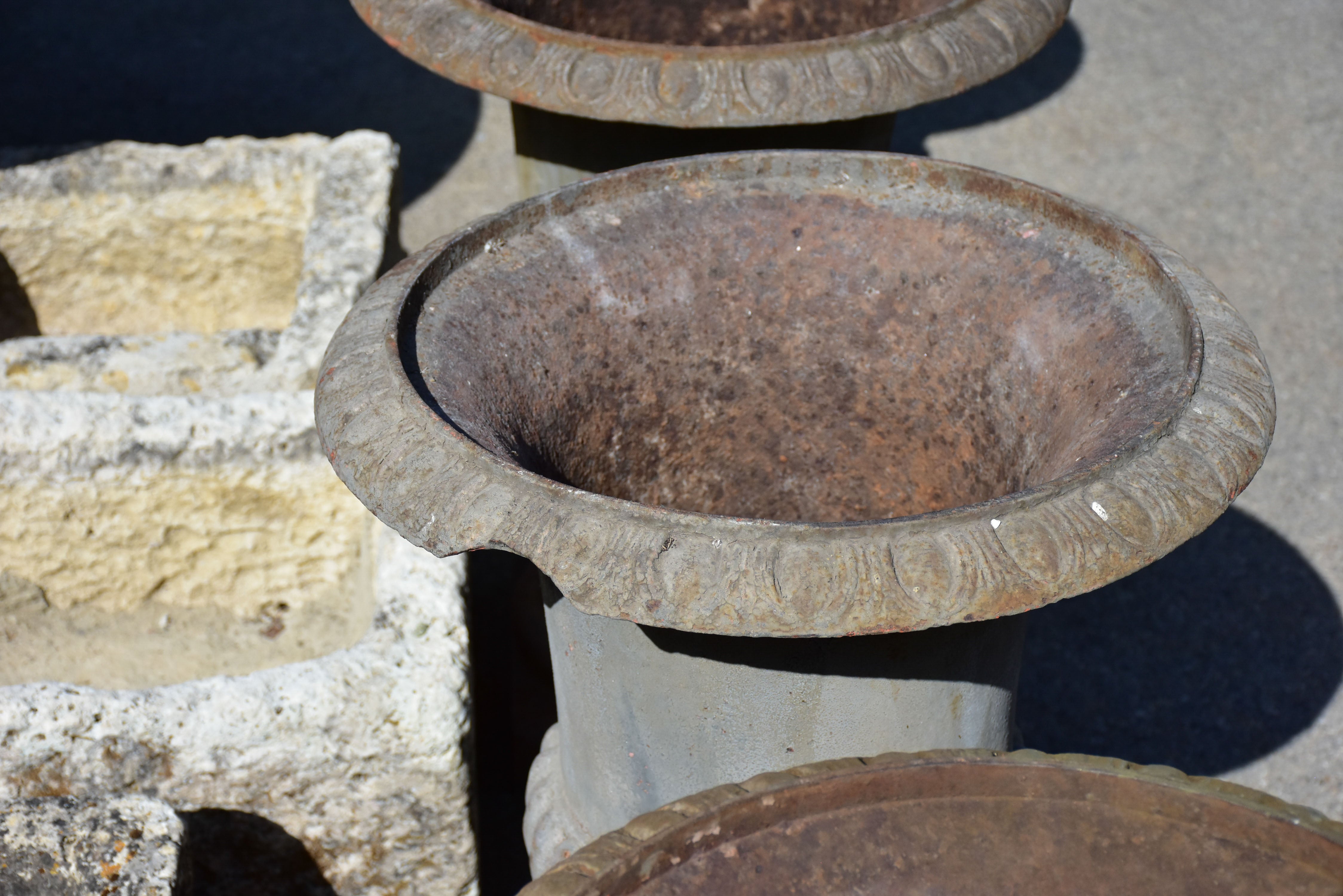 Collection of four cast iron medici urns from the 19th century