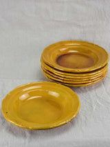 Set of seven mid century bowls with orange glaze 9½"