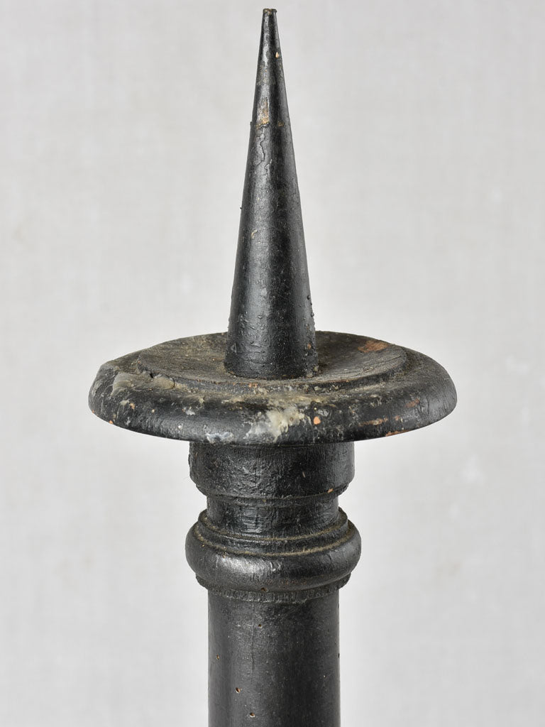 Nineteenth-century black painted wooden candlesticks