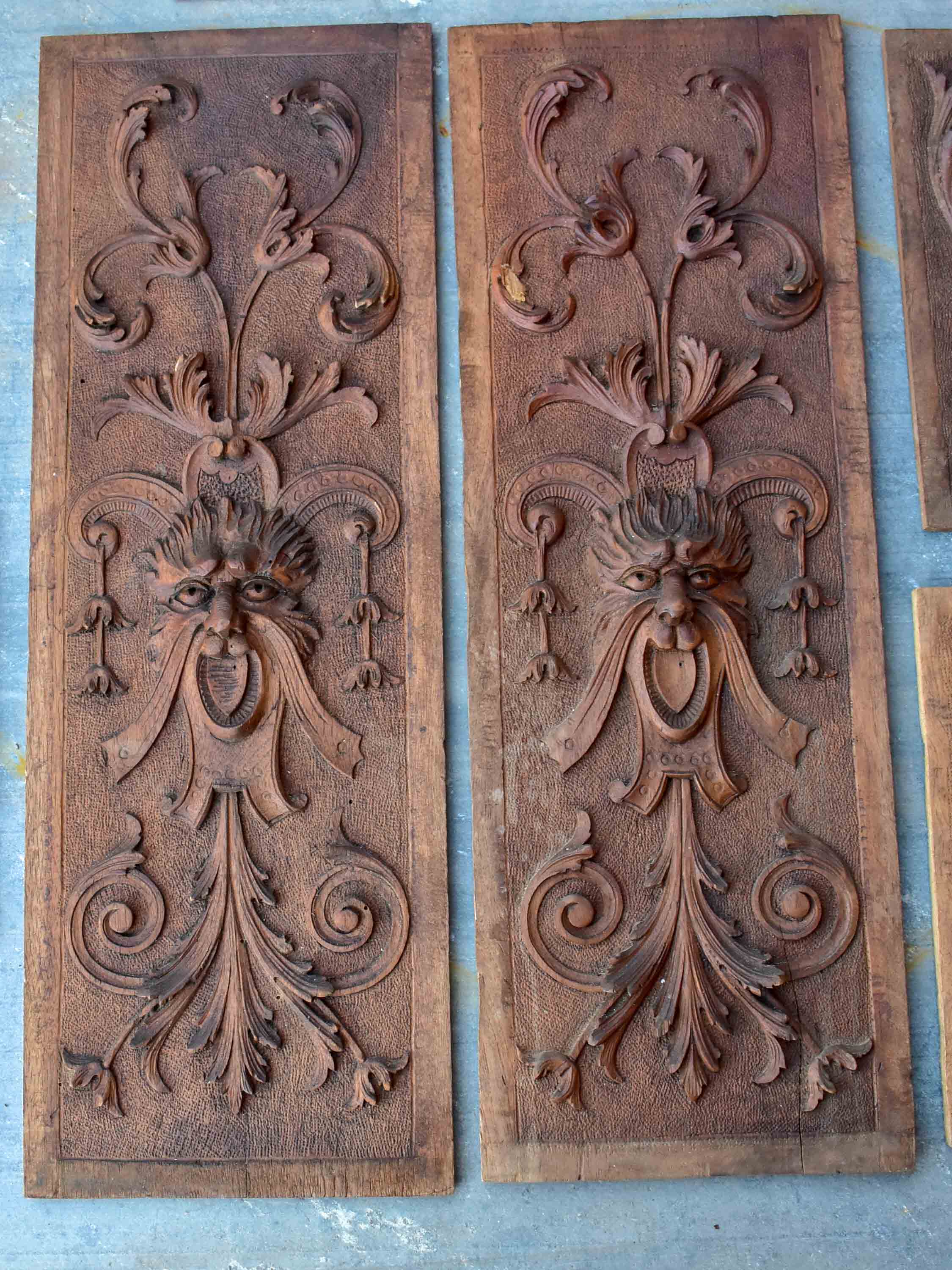Five pieces of antique Italian carved wood paneling