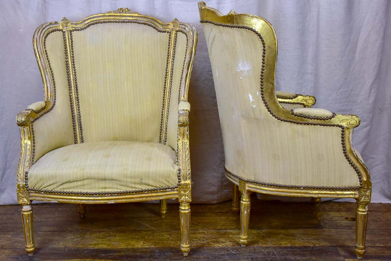 Pair of antique Louis XVI gilded armchairs