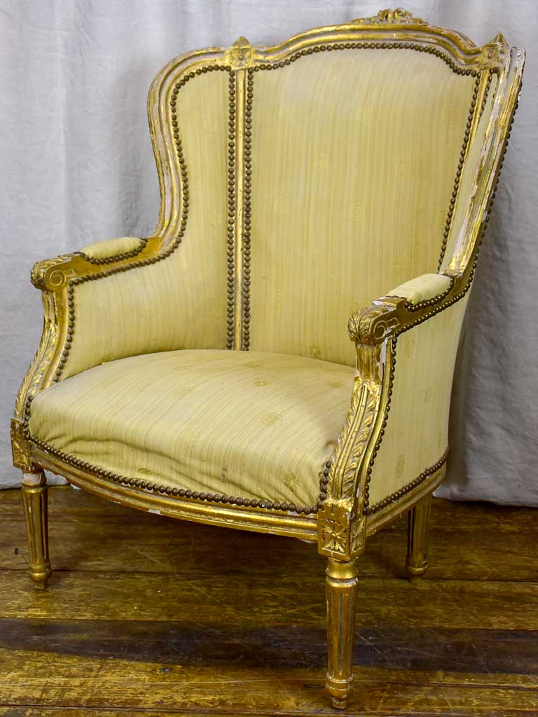 Pair of antique Louis XVI gilded armchairs