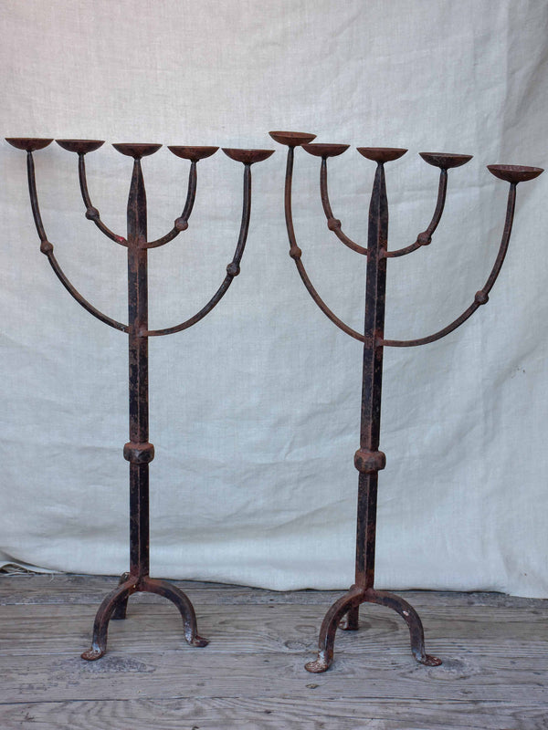 Pair of antique Italian wrought iron candlesticks