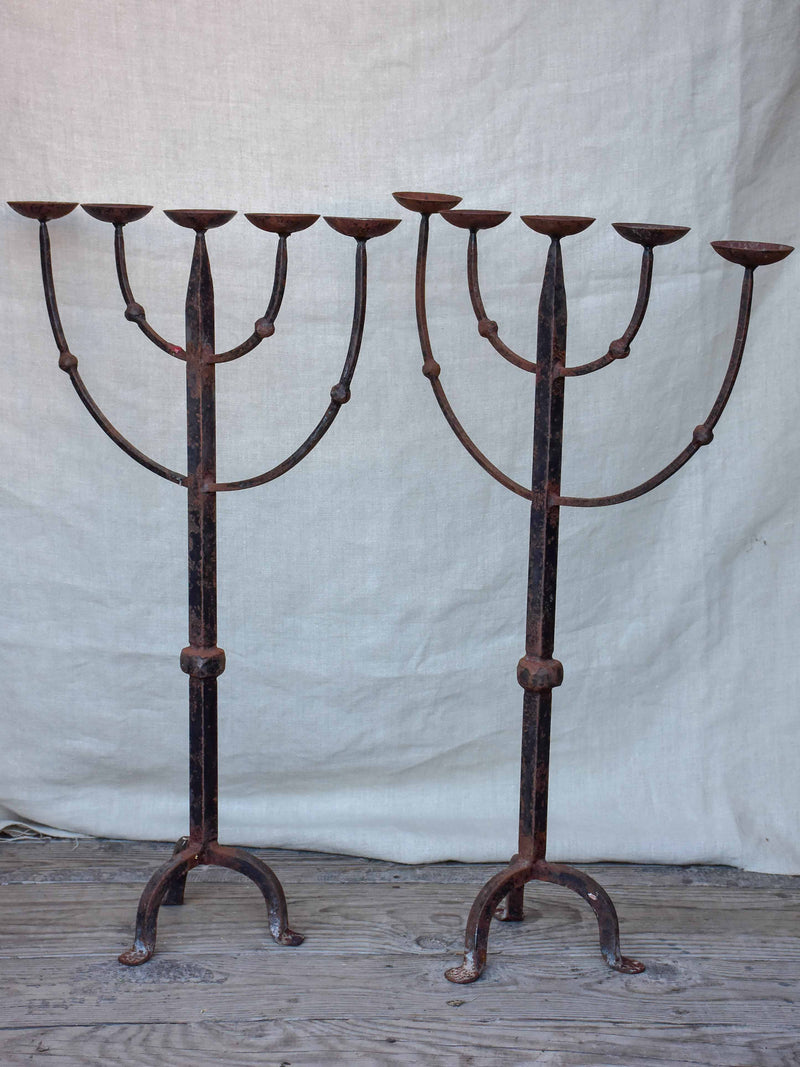 Pair of antique Italian wrought iron candlesticks
